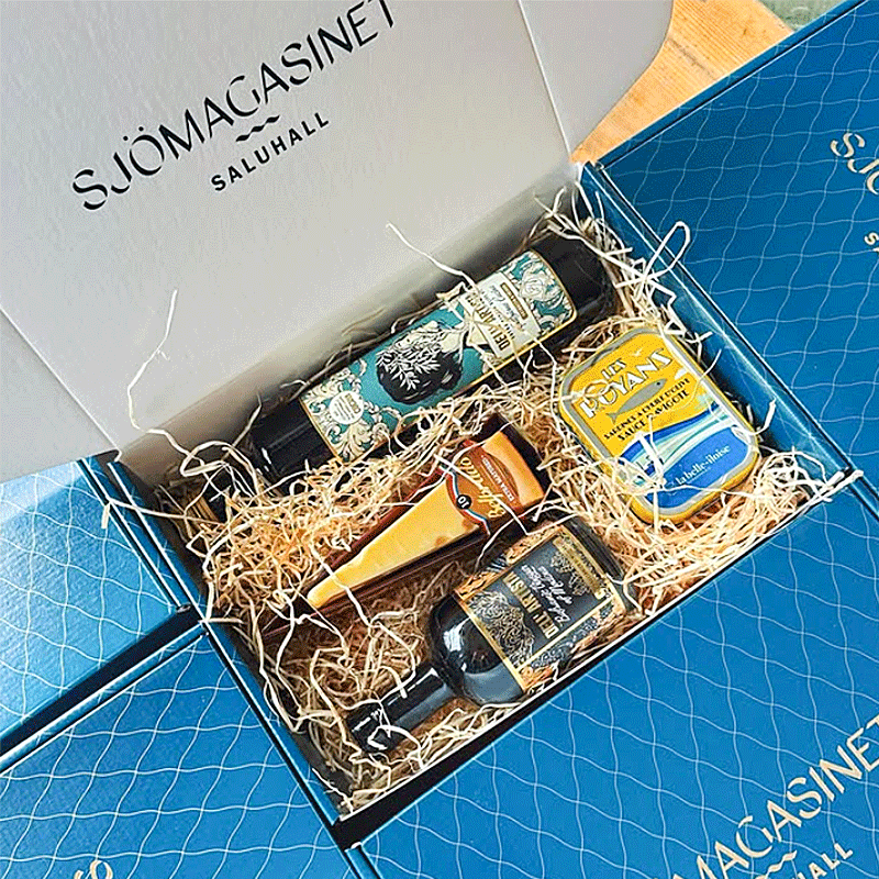 Blå presentförpackning med tryck