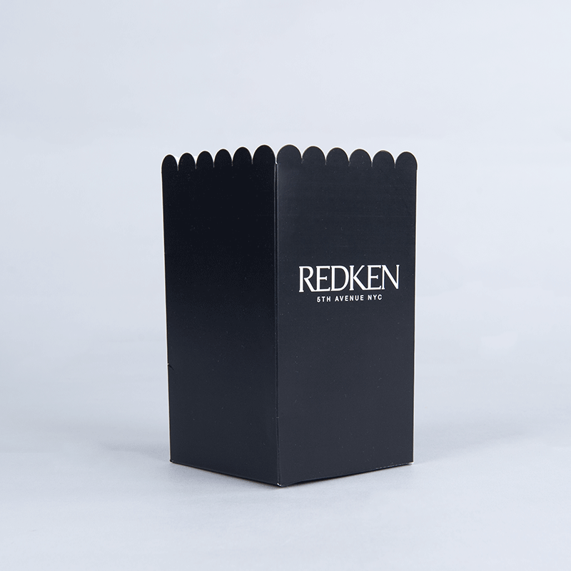 Popcornbehållare med eget tryck